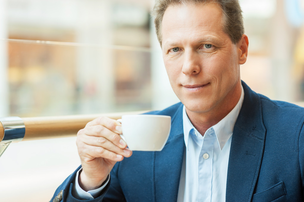 business man having coffee