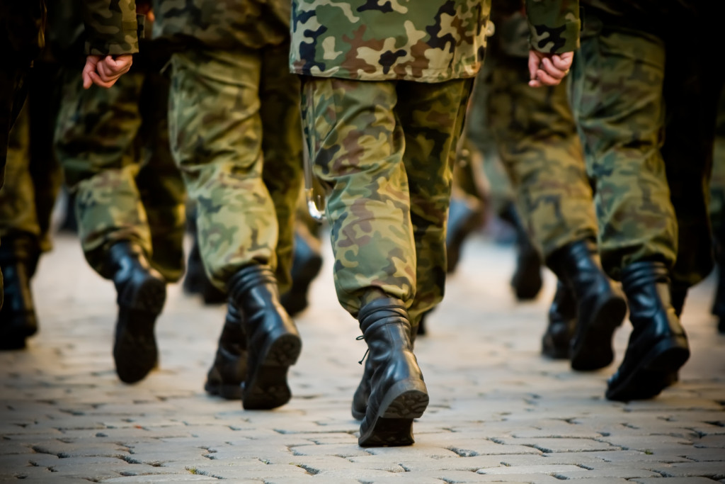 An image of soldiers' feet marching in formation