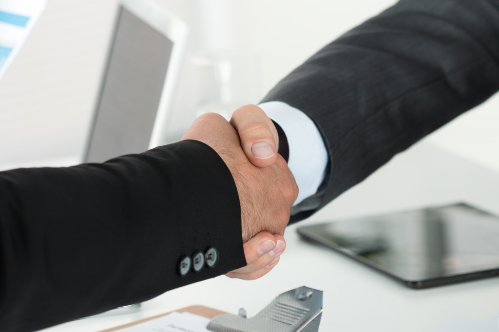 Two businessmen having a handshake