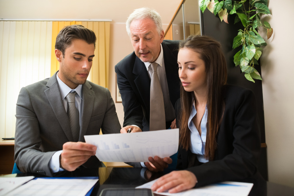 Executives planning the expansion of a business