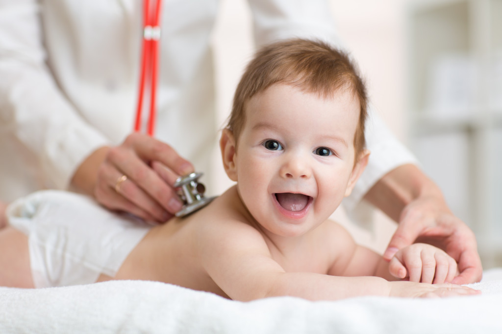 A baby boy having a checkup
